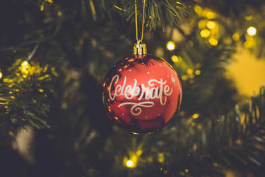 Picture of a Christmas tree ornament that says 